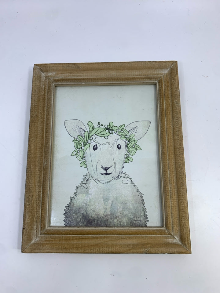 LAMB W/LEAF CROWN IN WOOD FRAME.