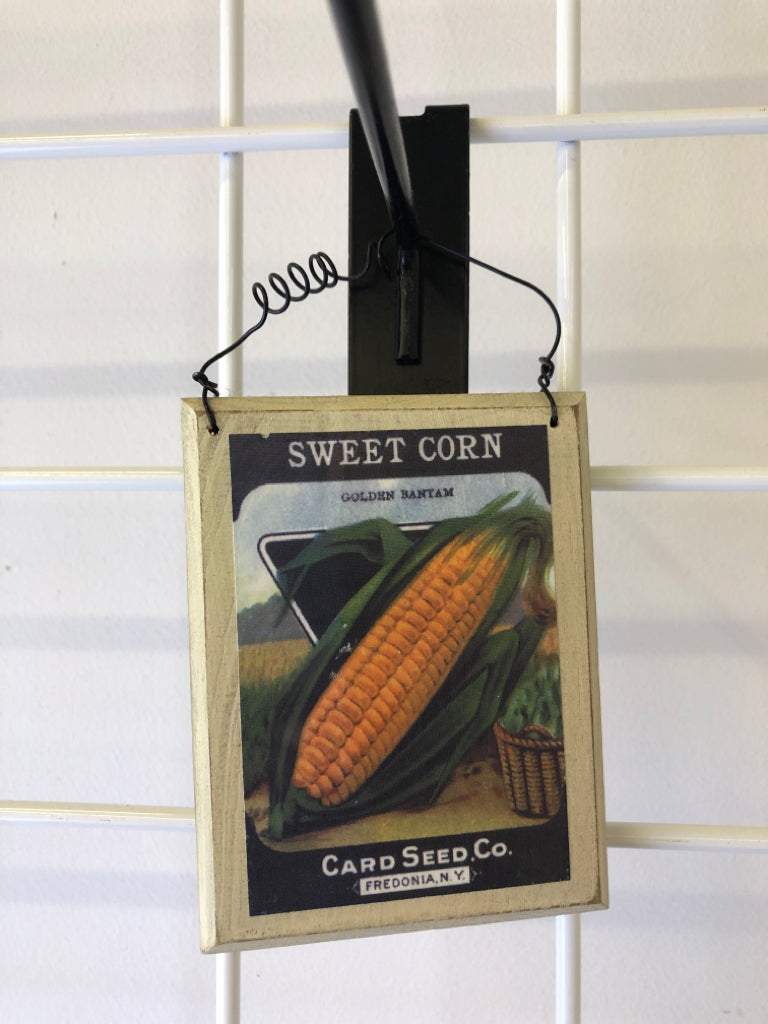 CORN SEED PACKET WALL HANGING.