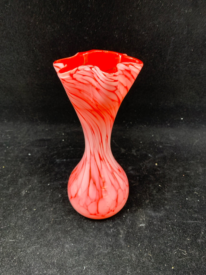 PALE RED SWIRL VASE W STAR SHAPED NECK.