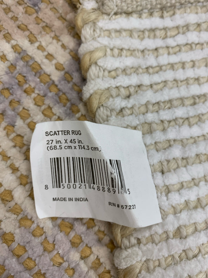 YELLOW STITCHED BEIGE & BLUE RUG.