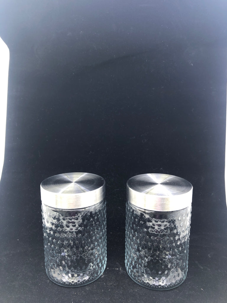 2 GLASS CANISTERS W/ EMBOSSED DOTS + METAL LIDS.