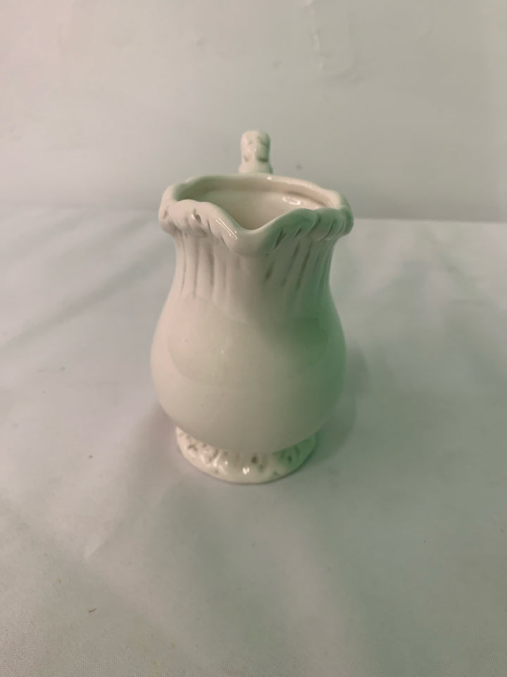 SMALL WHITE PITCHER.