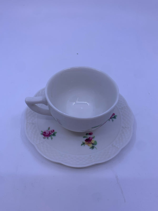 SMALL WHITE TEACUP AND SAUCER W/ ROSES.