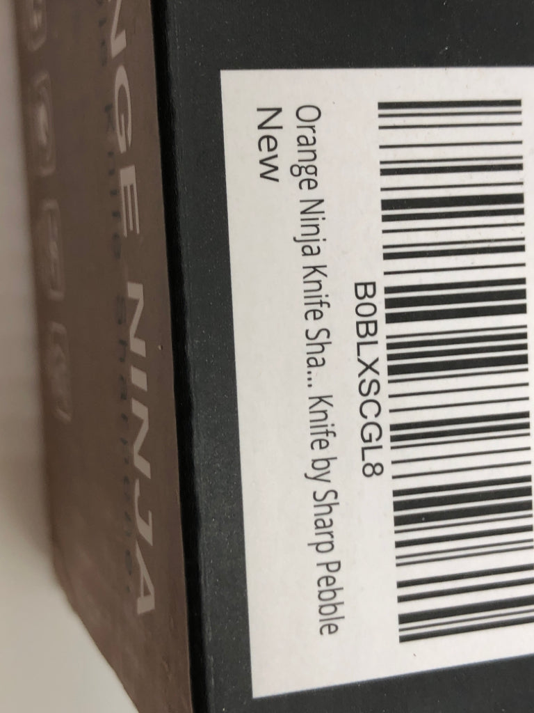 NIB ORANGE NINJA KNIFE SHARPENER.