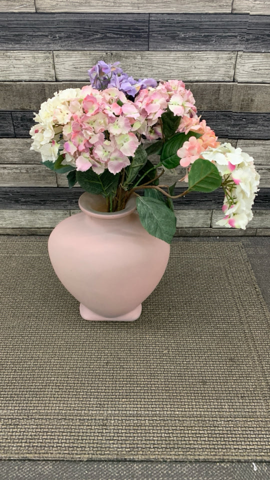 FAUX PINK HYDRANGEA IN LARGE PINK GLASS VASE.