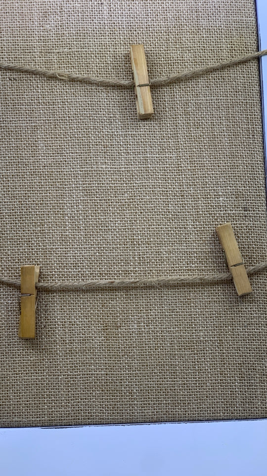 BURLAP PHOTO CLIP WALL HANGING W METAL BASKET.