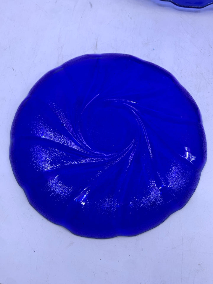4 COLBALT BLUE GLASS LUNCH PLATES.