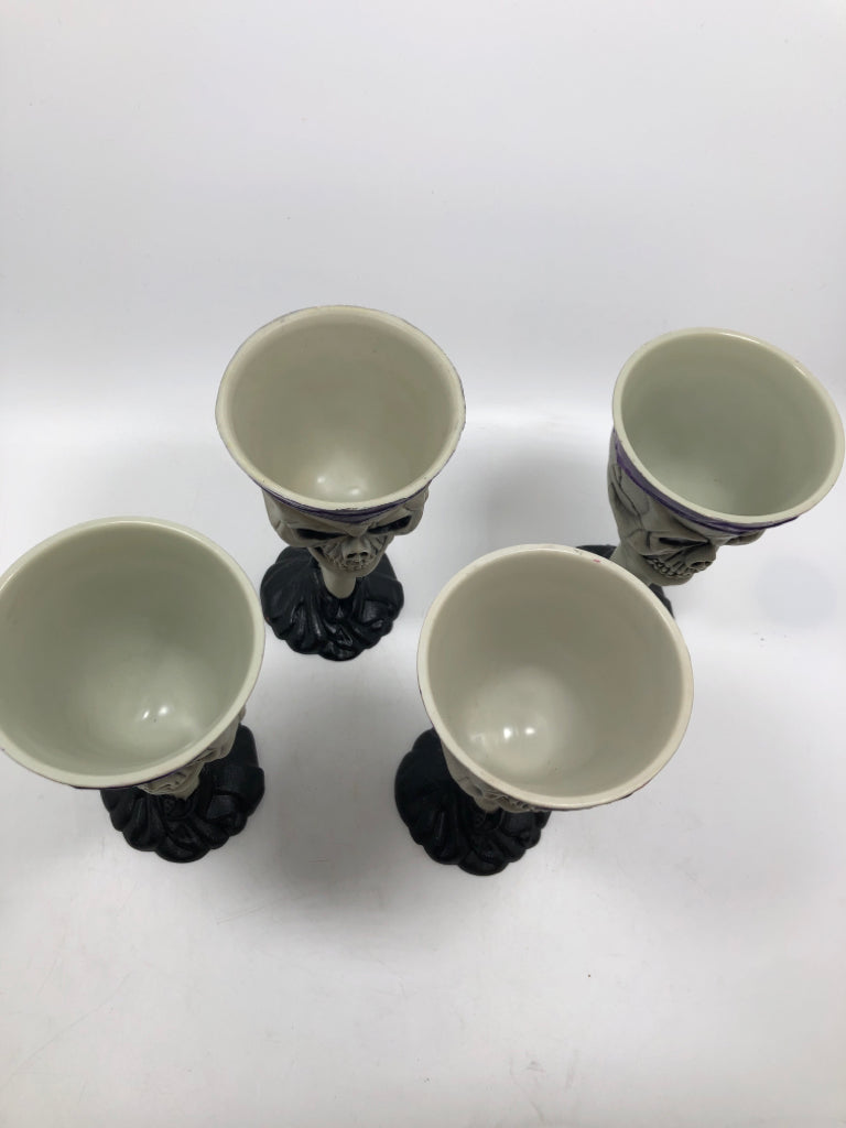 4 GRAY & PURPLE SKULL GOBLETS.