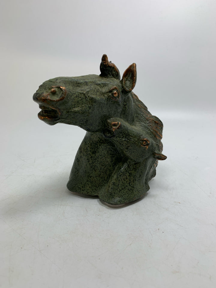 GREEN METAL HEAVY HORSE HEAD W/ BABY FIGURINE.
