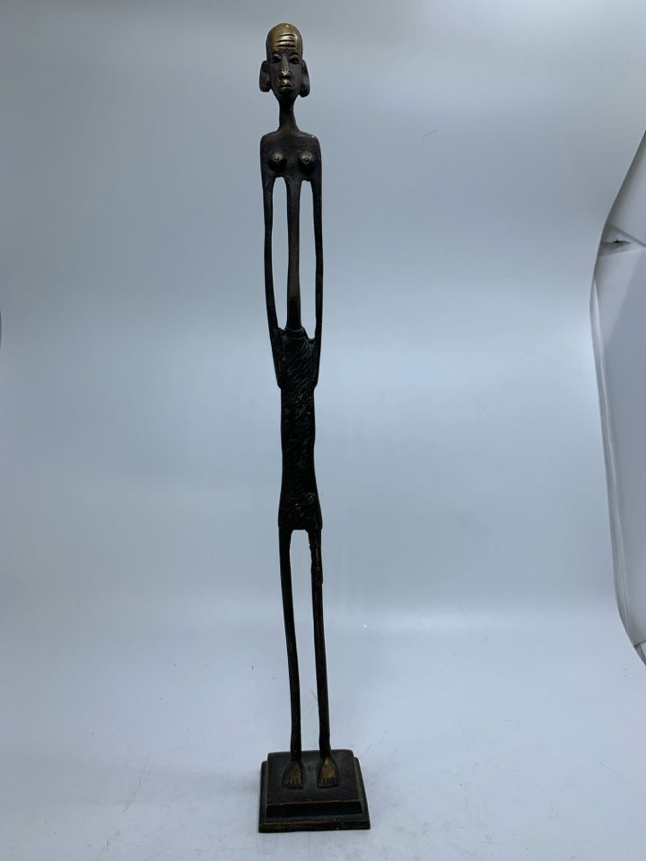 TALL METAL FOLK ART MAN W/ HANDS IN POCKETS.