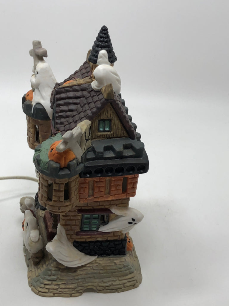 PORCELAIN ILLUMINATED "DRACULA" HAUNTED HOUSE.