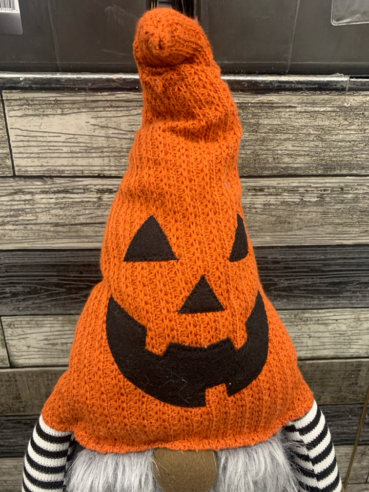 TALL GNOME W ORANGE HAT.