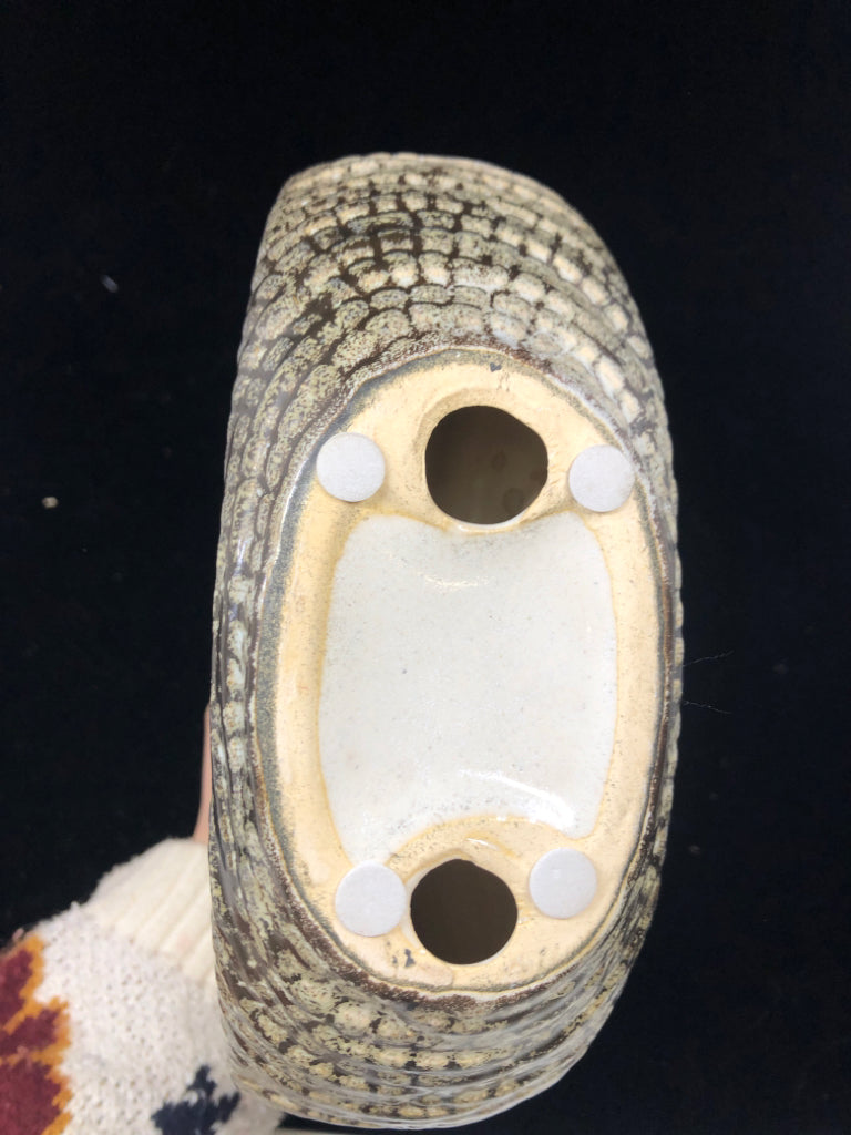 ABSTRACT CIRCULAR CUTOUT SCULPTURE CREAM AND BROWN.