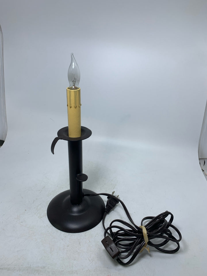 BROWN METAL BASE CANDLE LAMP.