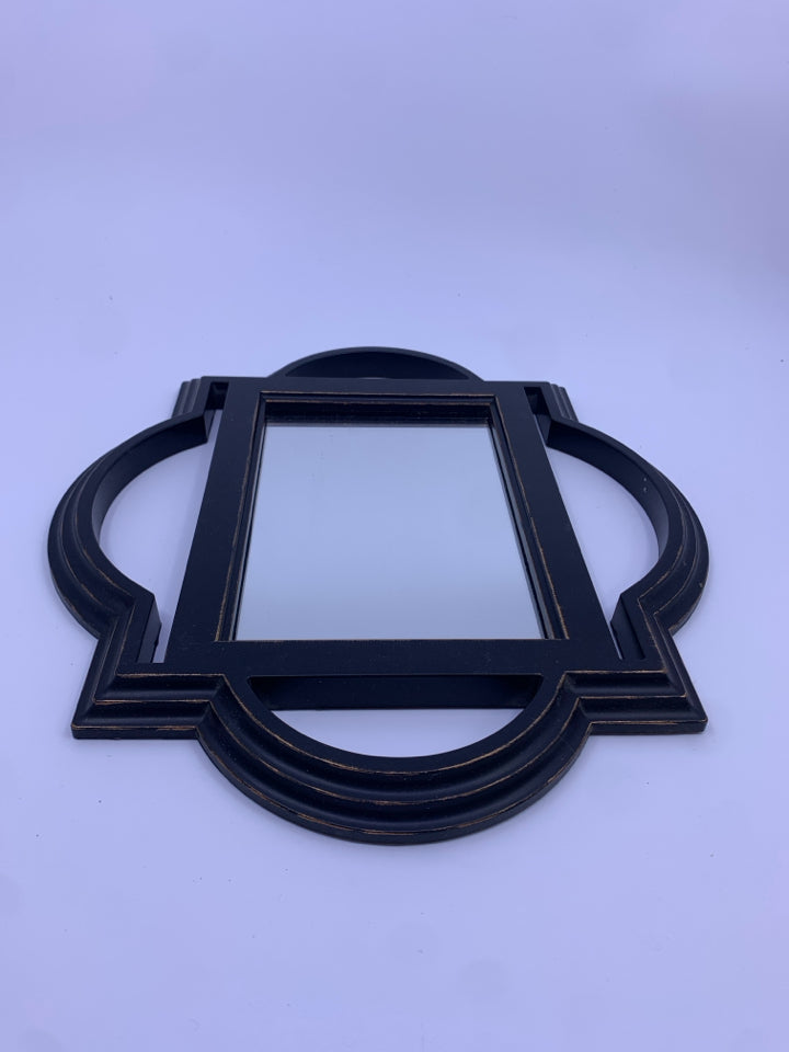 BLACK SCROLL FRAME MIRROR.