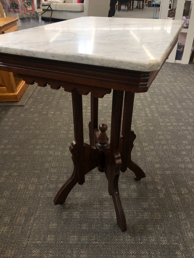 VTG MARBLE TOP VICTORIAN STYLE WALNUT END TABLE ON WHEELS.