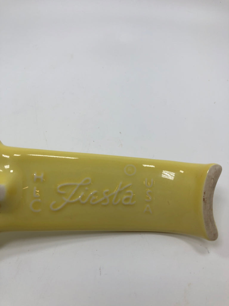 YELLOW FIESTA WARE SPOON REST.