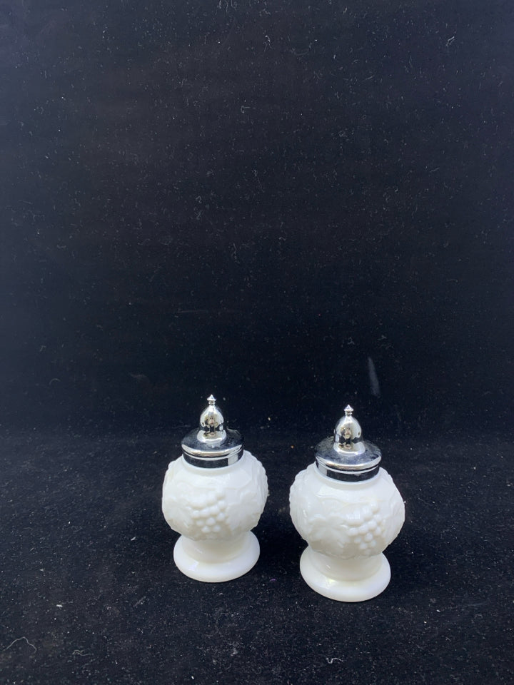 2 VTG MILK GLASS EMBOSSED SALT AND PEPPER SHAKERS.