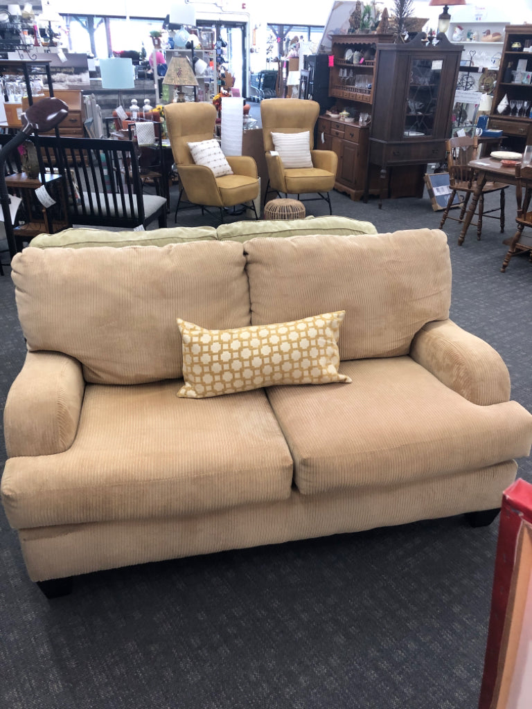 YELLOW CORDUROY LOVE SEAT.