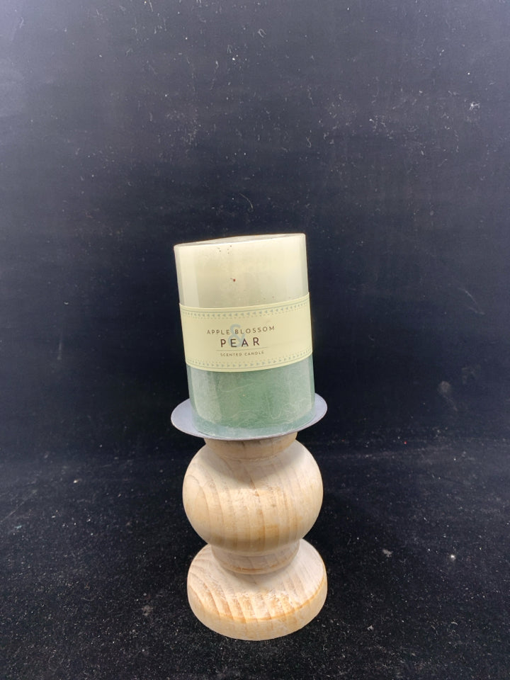 WOODEN CANDLE HOLDER WITH CANDLE.