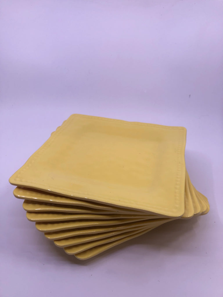 9 YELLOW SQUARE PLASTIC PLATES.