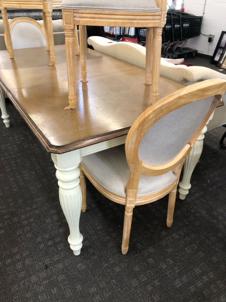 TABLE W/CREAM COLOR LEGS+ 4 WOODEN CHAIRS, + LEAF.