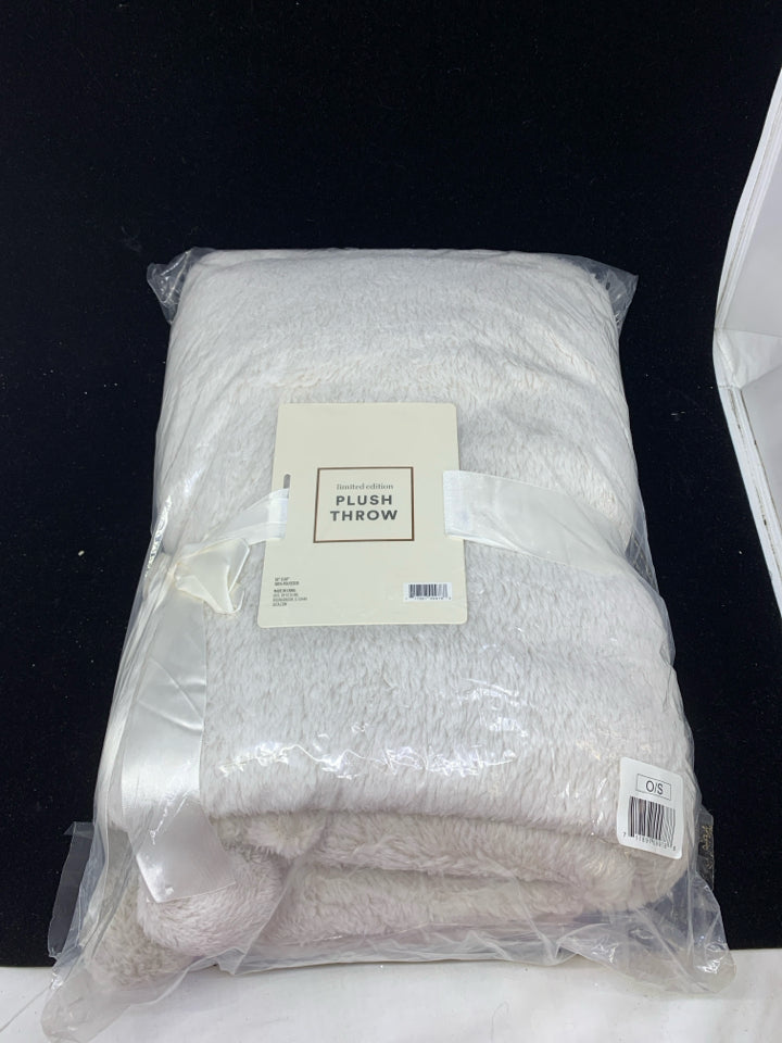 NIP PLUSH THROW.