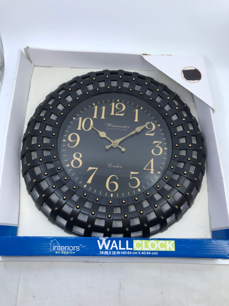 NIB BLACK WALL CLOCK.