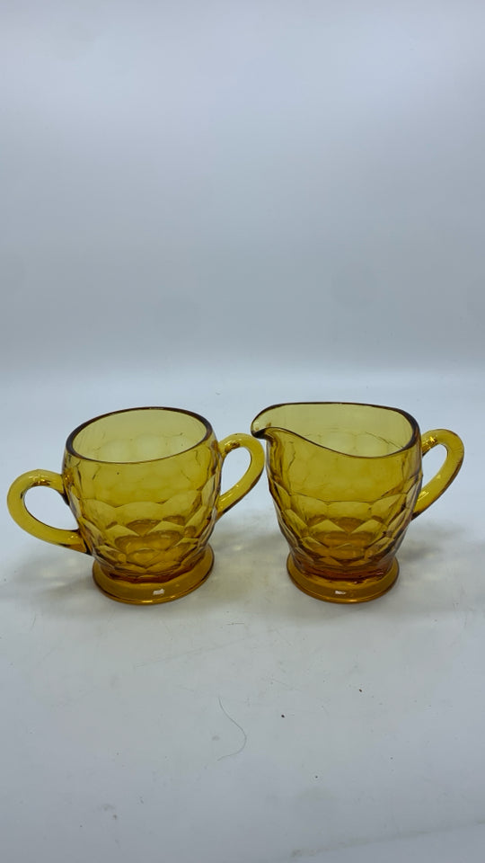 2PC AMBER GLASS SUGAR AND CREAMER SET.