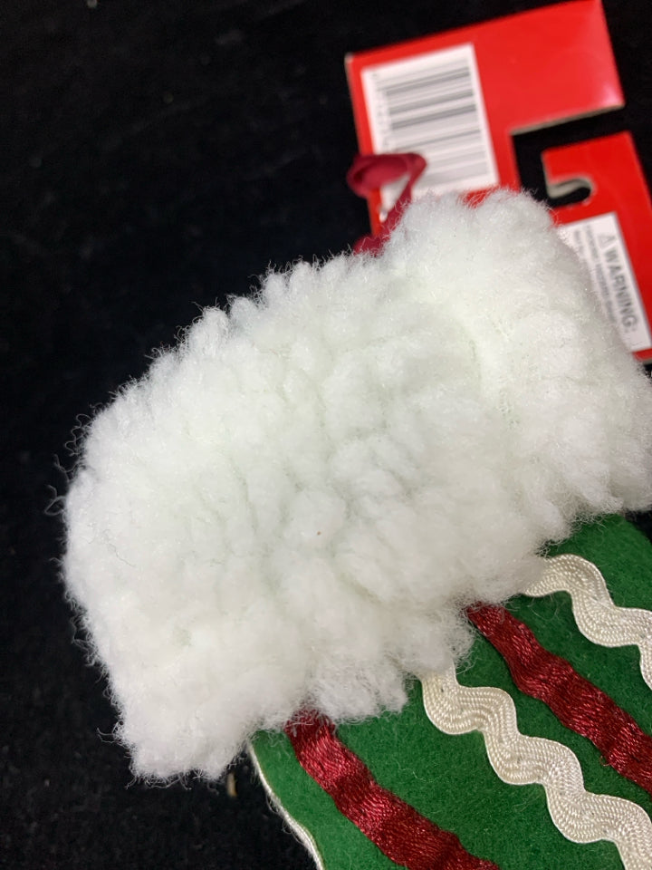 GREEN STOCKING GIFT CARD HOLDER.