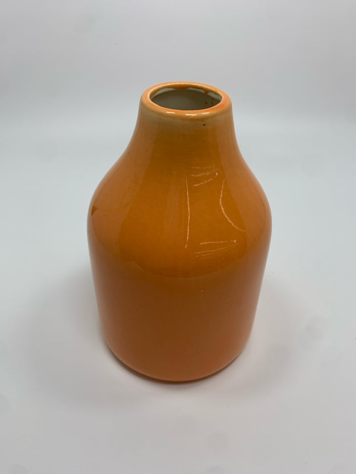 ORANGE CERAMIC BUD VASE.