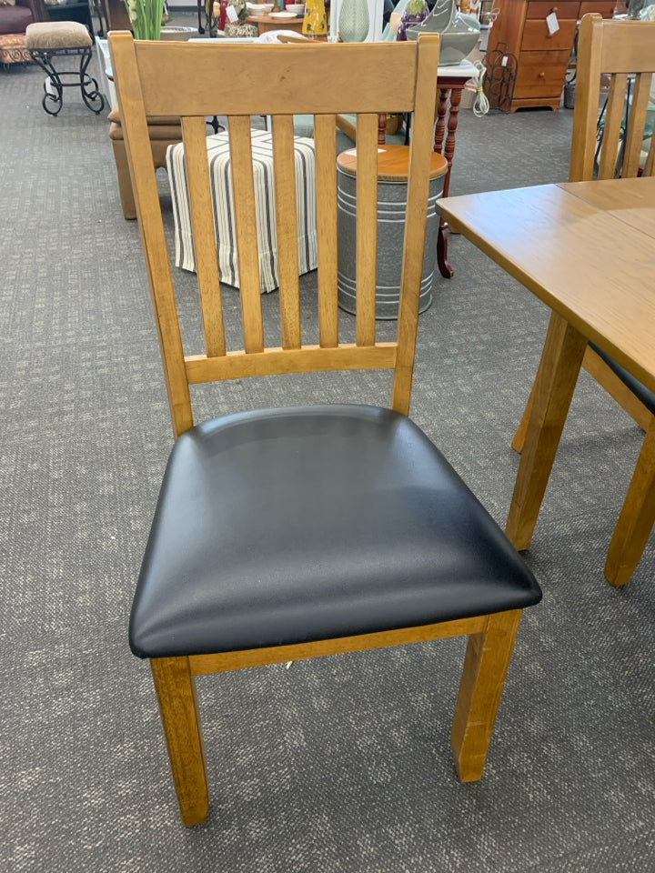 WOODEN KITCHEN TABLE W/ 4 CHAIRS.