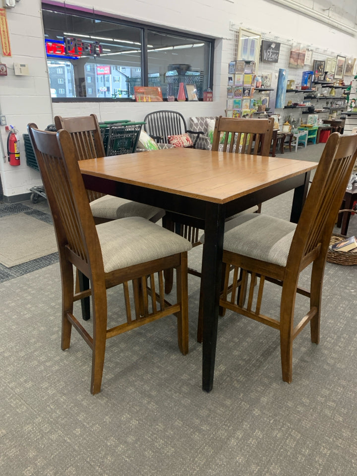 WOOD HIGH TOP TABLE W/ BLACK LEGS 4 UPHOLSTERED.