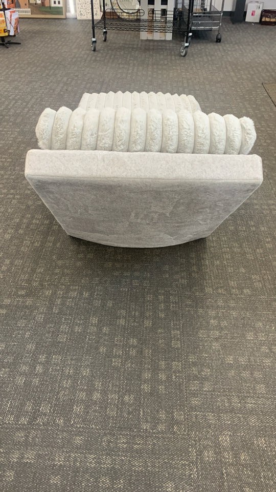 TEXTURED GREY FABRIC CHAISE LOUNGE.