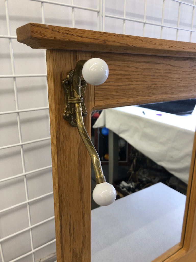 WALL MIRROR W/TWO COAT HOOKS.