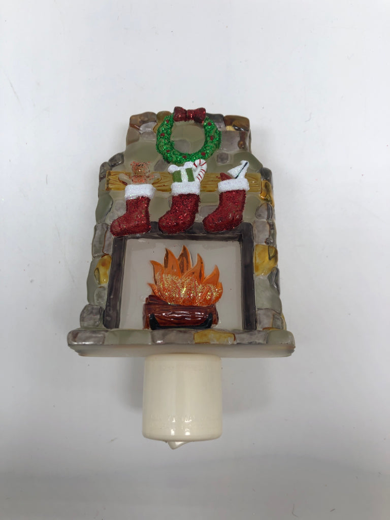 CHRISTMAS FIRE PLACE W/STOCKINGS NIGHT LIGHT PLUG IN.