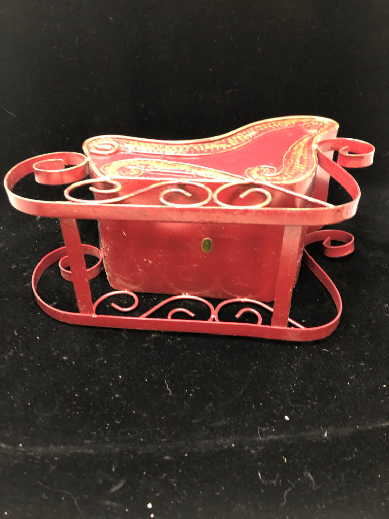 DISTRESSED RED METAL SLEIGH.