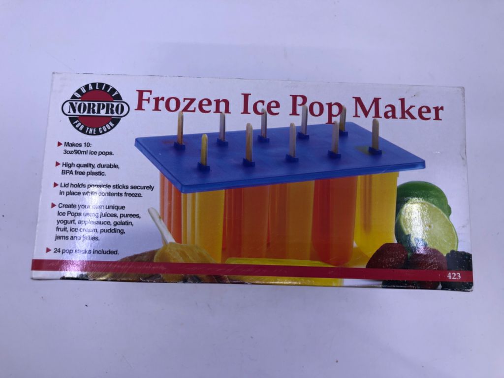 NIB FROZEN ICE POP MAKER.