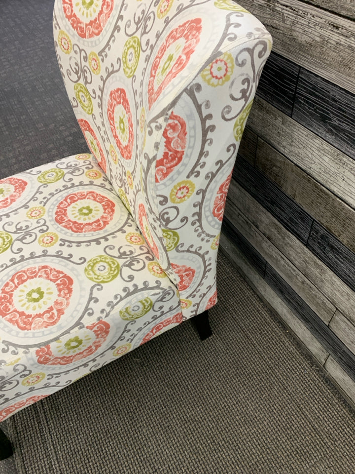 RED + GREEN FLORALS, WOOD LEGS ACCENT CHAIR.