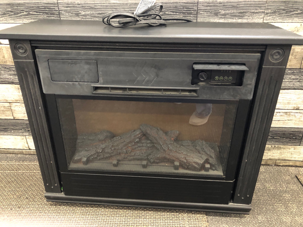 ELECTRIC FIREPLACE HEATER.