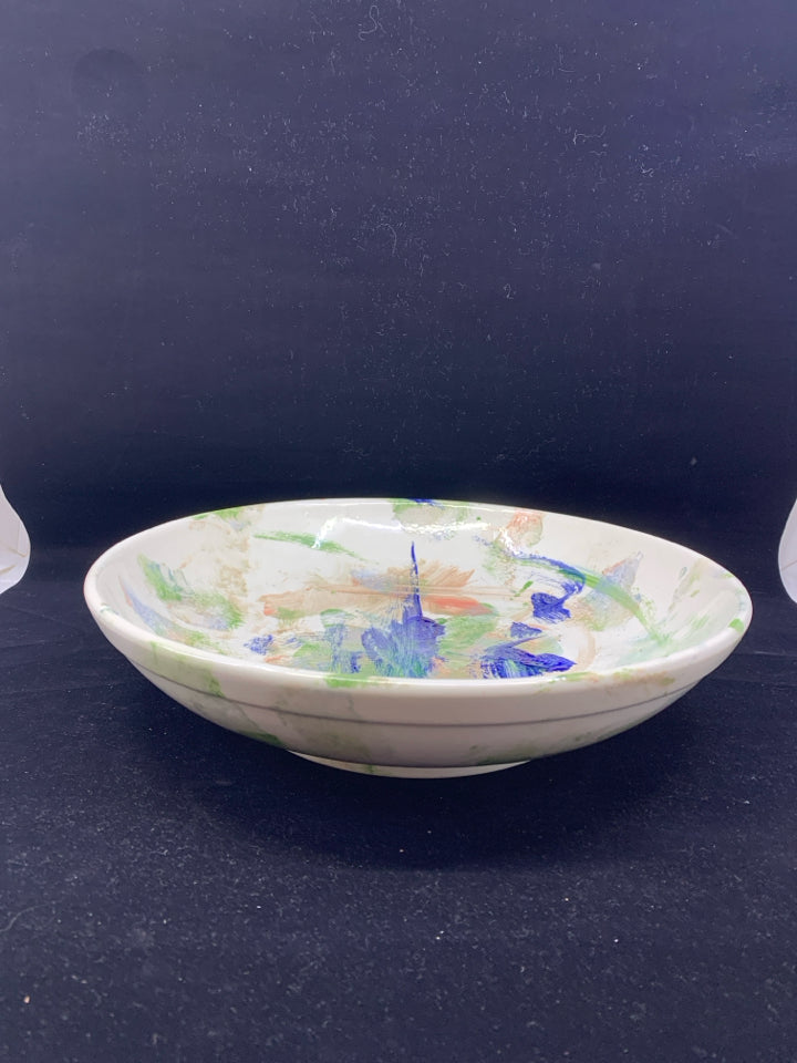 WHITE POTTERY BOWL W/ COLORFUL ABSTRACT DESIGN.