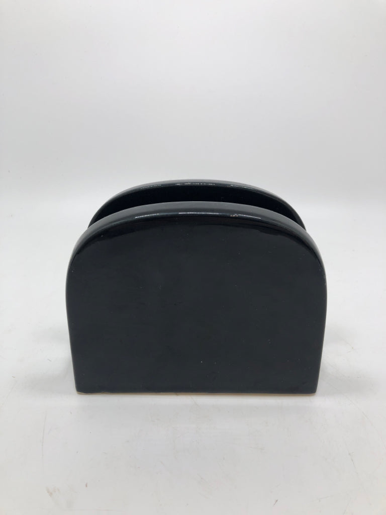 BLACK CERAMIC NAPKIN HOLDER.