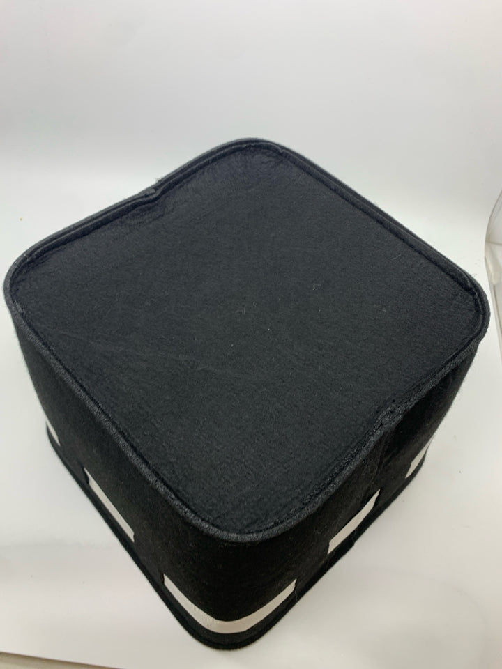 BLACK AND WHITE FELT BASKET WITH BOW.