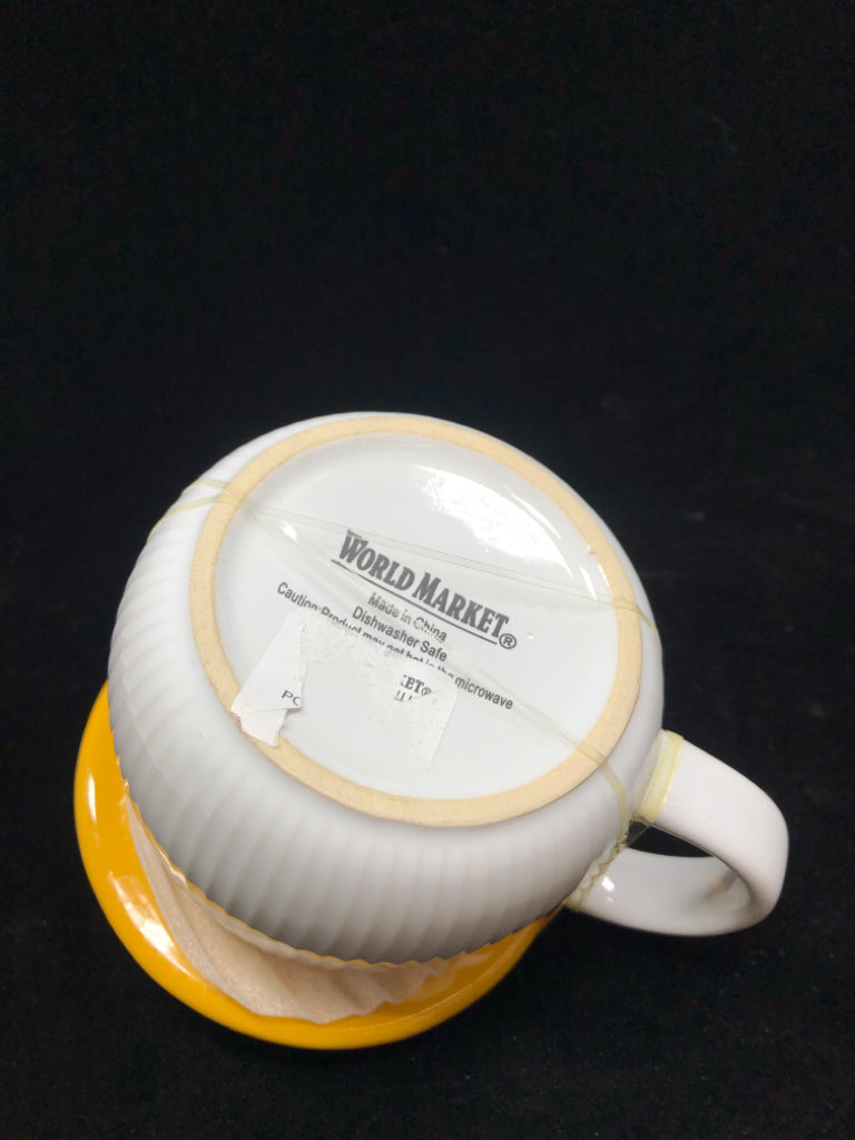 WORLD MARKET YELLOW MUSHROOM MUG W/LID.