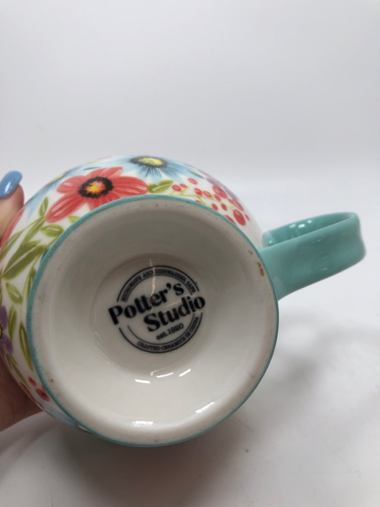 TEAL FLORAL FOOTED MUG.