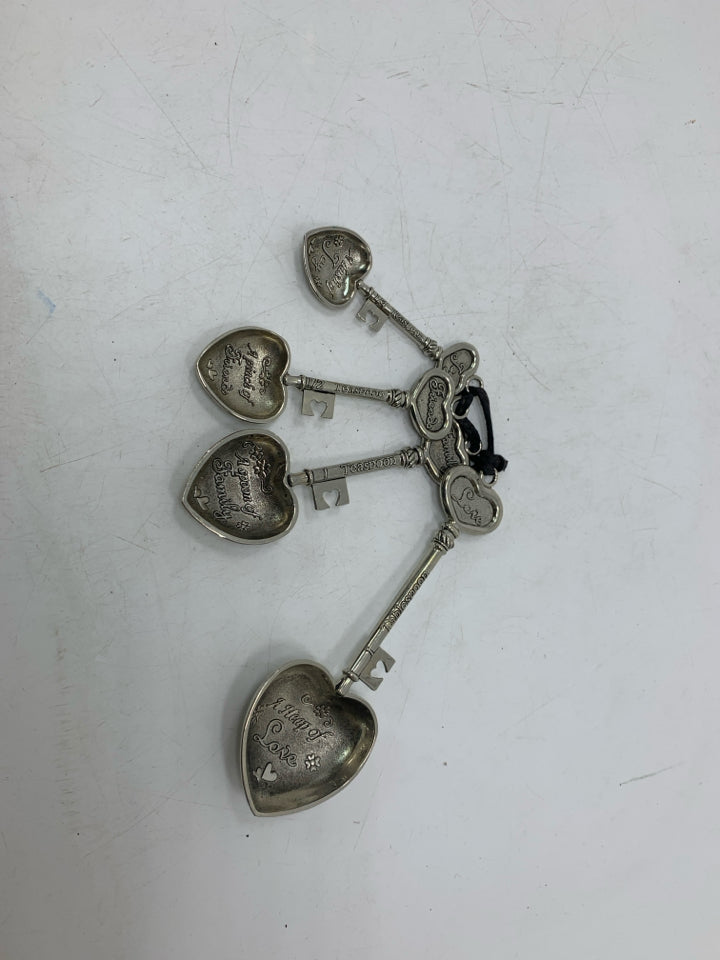 4 VTG METAL HEART SHAPED TEASPOONS.