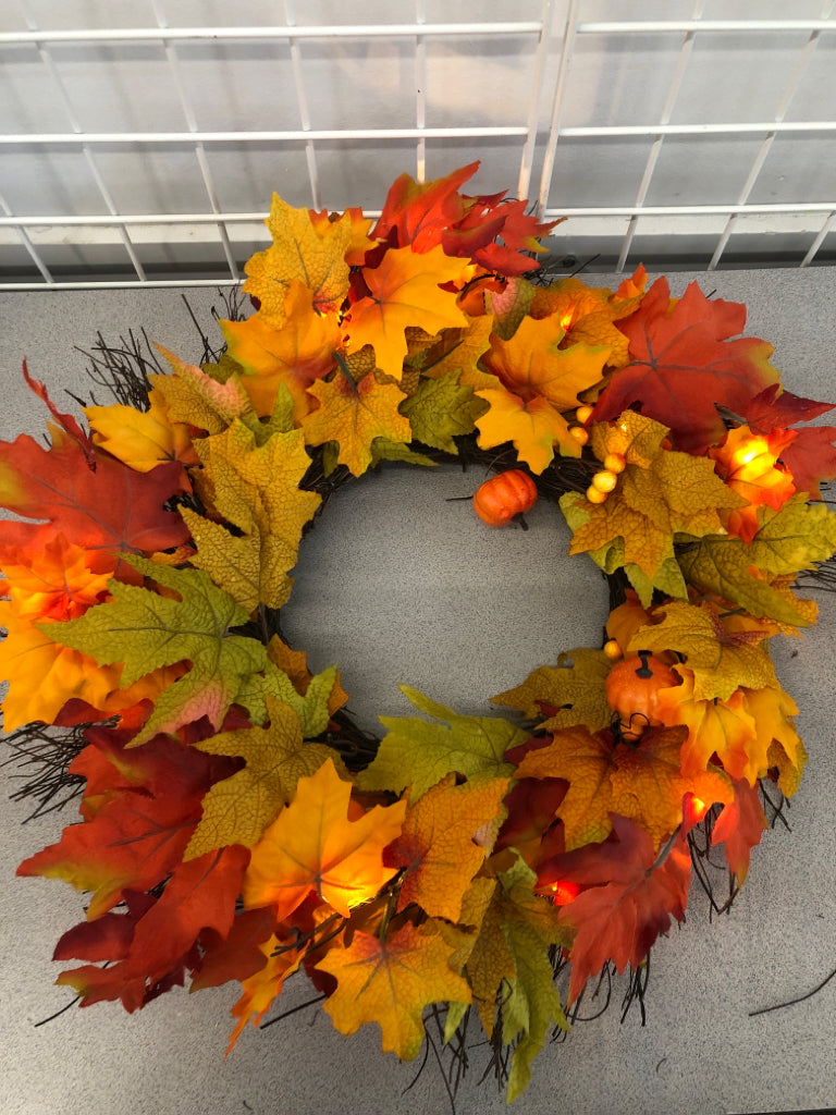 FAUX MAPLE LEAF AND PUMPKINS WREATH W/LIGHTS.