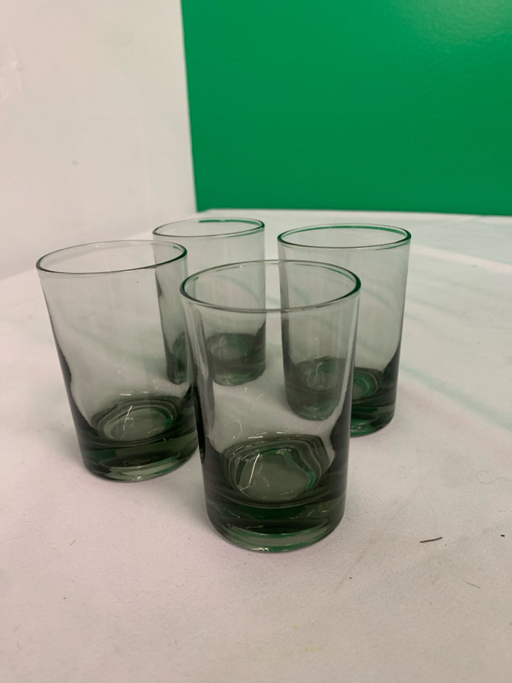 4 SMALL DARK JUICE GLASSES.