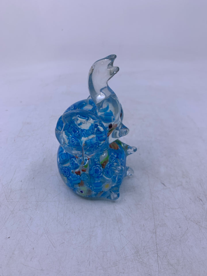 BLUE SITTING ELEPHANT W/ TRUNK UP.