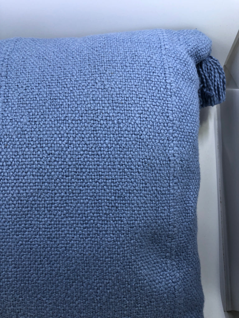 LT BLUE PILLOW W/TASSLES.